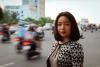 Image of Ms. Tran Khanh Dung in a bustling city of Vietnam 