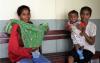 Mothers and their children at a local clinic in Timor-Leste