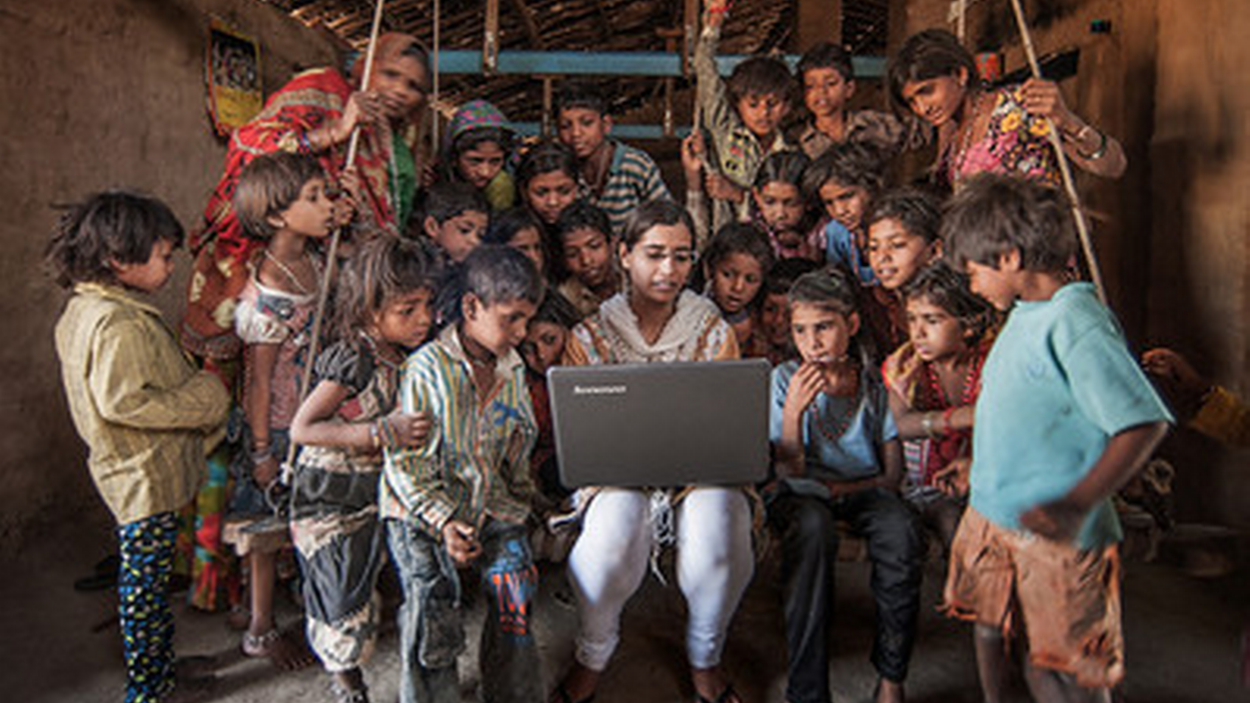         Children in front of a laptop
      